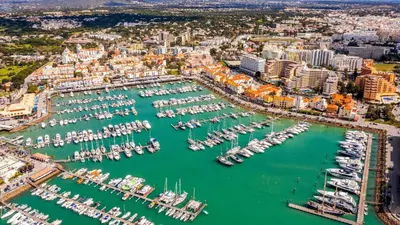 an aerial view of a harbor with boats at Moradia VSSG em Vilamoura in Quarteira