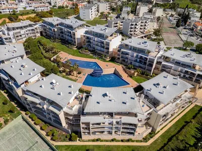 a path through a garden with trees and grass at Apartment Vista Mar by Interhome in Albufeira