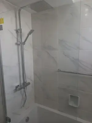 a bathroom with a sink and a mirror at Villa Blue - Aldeia do Golfe in Quarteira