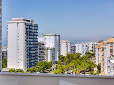 a view of a city skyline with tall buildings at AL Apartamento Alsol in Quarteira