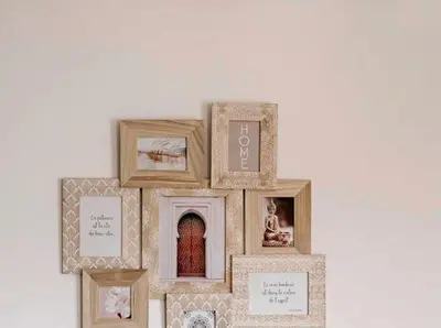 a collage of picture frames on a wall at Albufeira Boho Apartment in Albufeira