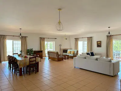 a living room with two couches and a coffee table at BnB Homes Luxurious Villa Stardust with Swimming pool & BBQ for Family Fun in Ameijoafas