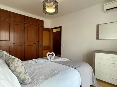a bedroom with a bed with two hearts on it at The Luna Apartment Faro - 2 Bedroom Private Apartment in Faro