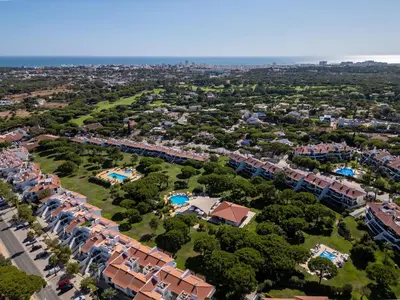 an aerial view of a resort with a park at 5 star Luxury SevenPines apartment with large balcony and 3 communal pool in Quarteira