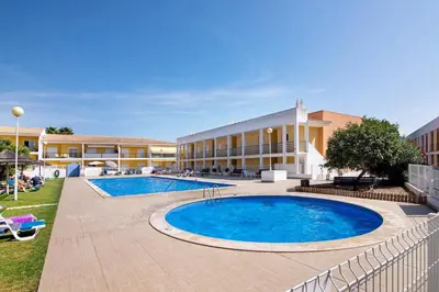a large swimming pool in front of a building at Encosta São José in Guia