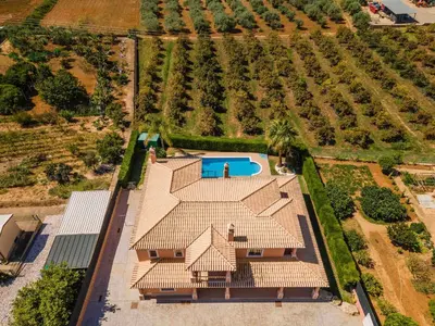 an aerial view of a house with a swimming pool at Villa Hunês in Guia