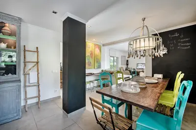 a dining room with a table and chairs at SeaBreeze by Algarve Villa Holidays in Galé