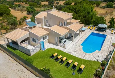 an aerial view of a house with a swimming pool at Villa Paloma by Algarve Vacation in Albufeira