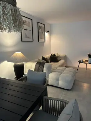 a living room with two couches and a couch at Casa Mocha Vale do lobo 2 bed apartment in Loulé