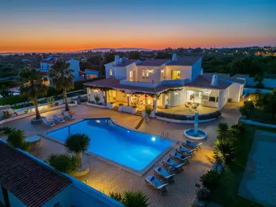 an aerial view of a house with a swimming pool at Villa Serena by Algarve Vacation in Guia