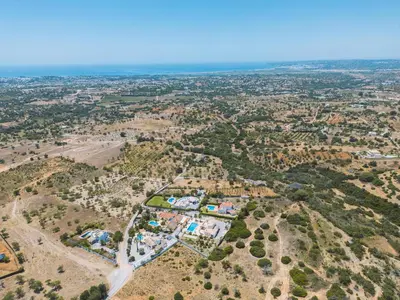 an aerial view of a city with houses and trees at Villa Serena by Algarve Vacation in Guia