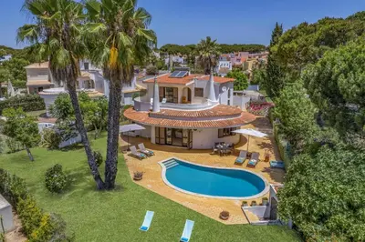 an aerial view of a house with a swimming pool at Villa Casa Jasmim by Villa Plus in Quarteira