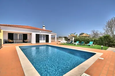 a swimming pool in the backyard of a house at Villa Santa Maria Valley - Private Pool in Albufeira