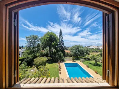 a view of a swimming pool from a window at Villa Casa Pepa-Paca - Swiming Pool & Air Condition - Albufeira - Sesmarias - BY BEDZY in Albufeira
