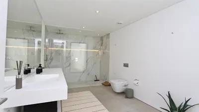 a white bathroom with a sink and a toilet at Villa Malibu - Onesix2, Cleverdetails CD 285 in Vilamoura