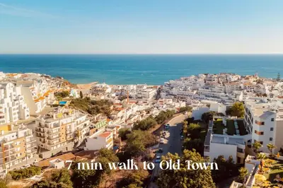 an aerial view of a city with the ocean at BrisaMar Villas: Sol, Mar, Serenidade in Albufeira