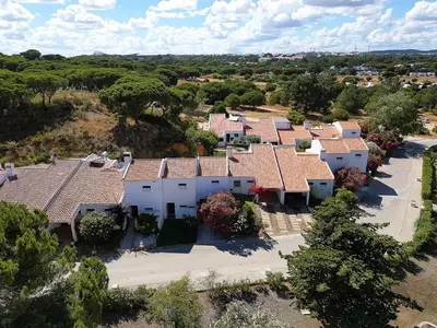 an overhead view of a row of white houses at Villa Mar e Sol by HelloVacations in Olhos de Água
