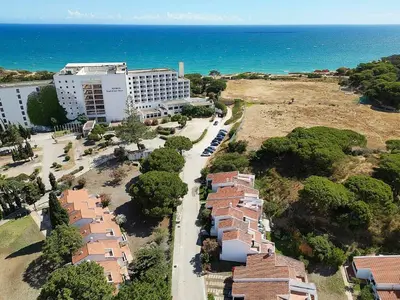 an aerial view of a hotel and the ocean at Villa Mar e Sol by HelloVacations in Olhos de Água