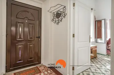 a door with a welcome mat in front of it at #236 Texugueiras 148 by Home Holidays in Ferreiras
