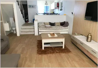 a living room with a couch and a coffee table at Windmill Hill - Alto do Moinho - Pool & Sea View in Albufeira