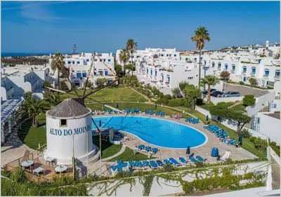 an aerial view of a resort with a pool and buildings at Windmill Hill - Alto do Moinho - Pool & Sea View in Albufeira