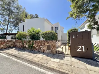 a house with a gate with the number on it at Vilamoura Premium Villa With Pool by Homing in Vilamoura