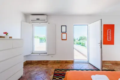 a bedroom with a bed with towels on it at Villa 715 - our Albufeira holiday retreat in Albufeira