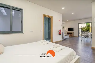a view of a building with a swimming pool at #235 New City by Home Holidays in Albufeira