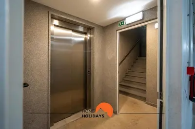 a elevator in a building with a stairway at #235 New City by Home Holidays in Albufeira