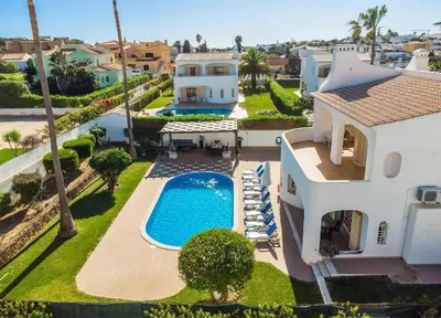 an aerial view of a house with a swimming pool at Villa Baltin in Albufeira