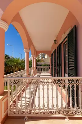 a balcony of a house with white railings at Villa Agadir by Algarve Vacation in Albufeira