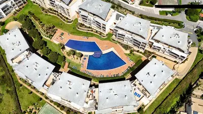 an overhead view of a building with a pool at Sea View Apartment by Be Cherish in Albufeira
