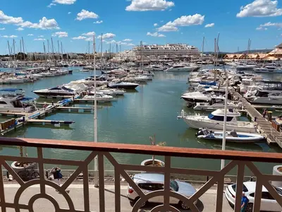 a marina filled with lots of boats in the water at T1 Vista Marina de Vilamoura in Vilamoura