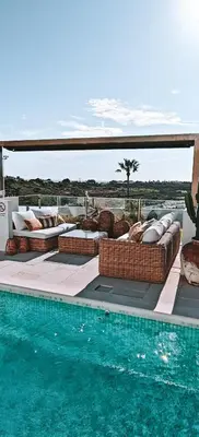 a villa with a pool and a gazebo at Casa Gina by Sunnyway in Albufeira