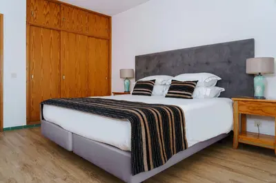 a wooden room with a tub in a wooden cabin at Luna Hotel da Oura in Albufeira