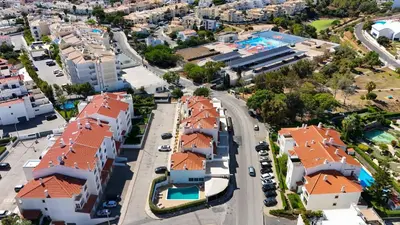 an aerial view of a city with houses at Garnero Apartment by HelloVacations in Albufeira