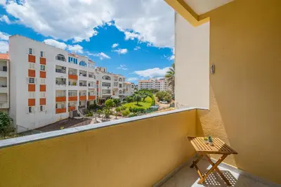 a balcony with a view of the city at Blue Wave Apartment in Albufeira