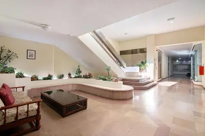 a large living room with a couch and a table at Apartamento Sousa e Filhos in Albufeira