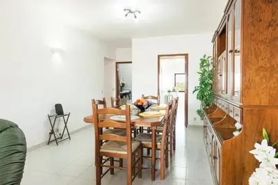 a bedroom with a bed with purple sheets and pillows at Modern apartment in Vilamoura with shared pool in Vilamoura