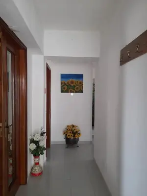 a bedroom with a bed with a picture on the wall at Modern apartment in Vilamoura with shared pool in Vilamoura