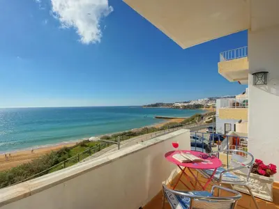 a balcony with a view of the beach at Inn The Beach Apartments by Seareen in Albufeira