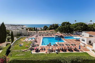 an aerial view of a resort with a swimming pool at Studio avec vue mer et piscine Algarve Portugal in Albufeira