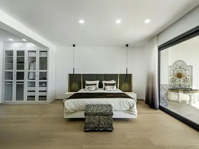 a living room with a couch and a fireplace at Villa Flor de Lis - VIP Properties by Interhome in Paderne