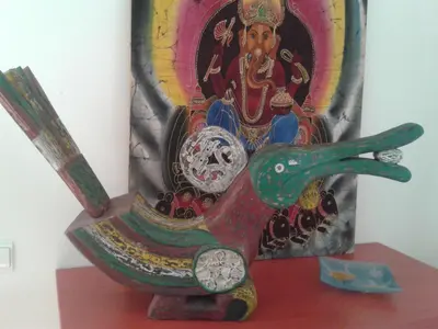a vase with a painting of a god on it at Casa da Praia in Albufeira