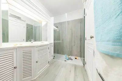 a kitchen with a washing machine and a sink at Apartment Portofino 1 by Algarve Vacation in Vilamoura