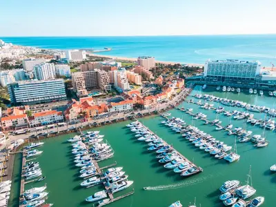 an aerial view of a harbor filled with boats at Apartment Portofino 2 by Algarve Vacation in Quarteira