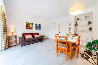 an aerial view of a city and the ocean at Apartment Portofino 2 by Algarve Vacation in Quarteira