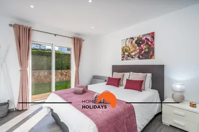 a bedroom with a bed with the words have hudas at #239 Vivenda V3 com Piscina by Home Holidays in Albufeira