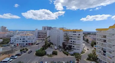 a view of a city from a balcony at Casa Patricia in Albufeira