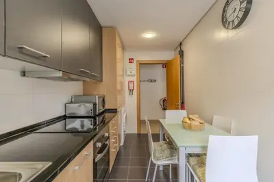 a living room with a couch and a table at #251 Coronel Águas by Home Holidays in Albufeira